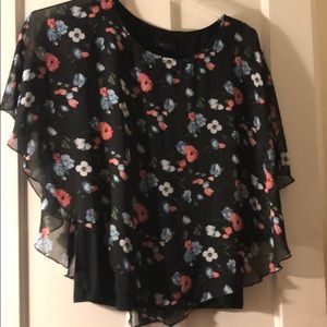 Tank with floral overlay